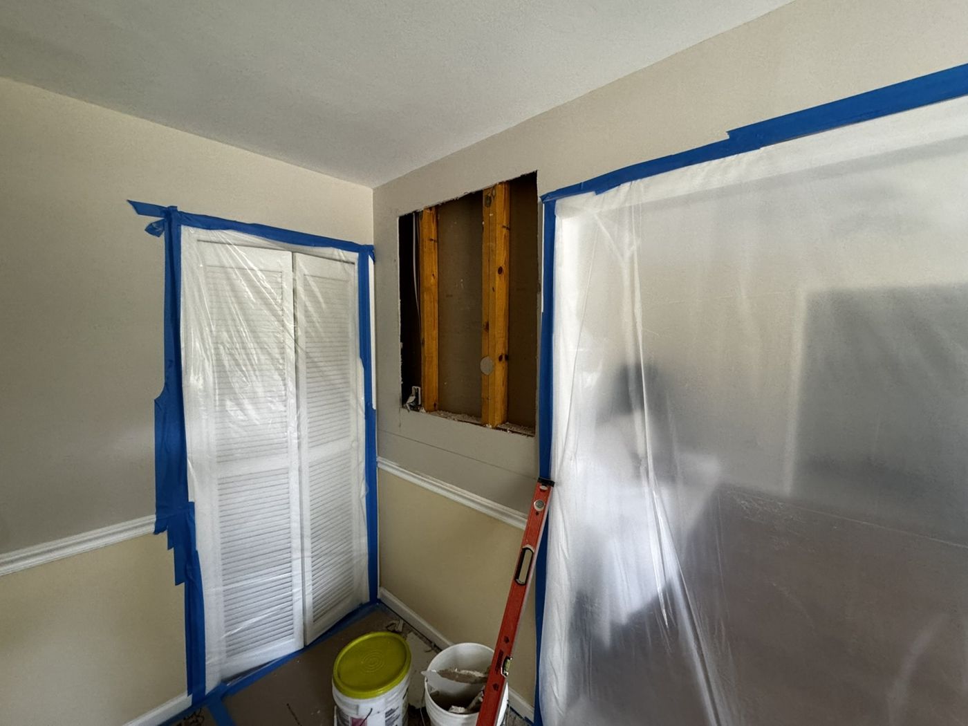 Drywall Repair & Interior Painting — Before — wall opened